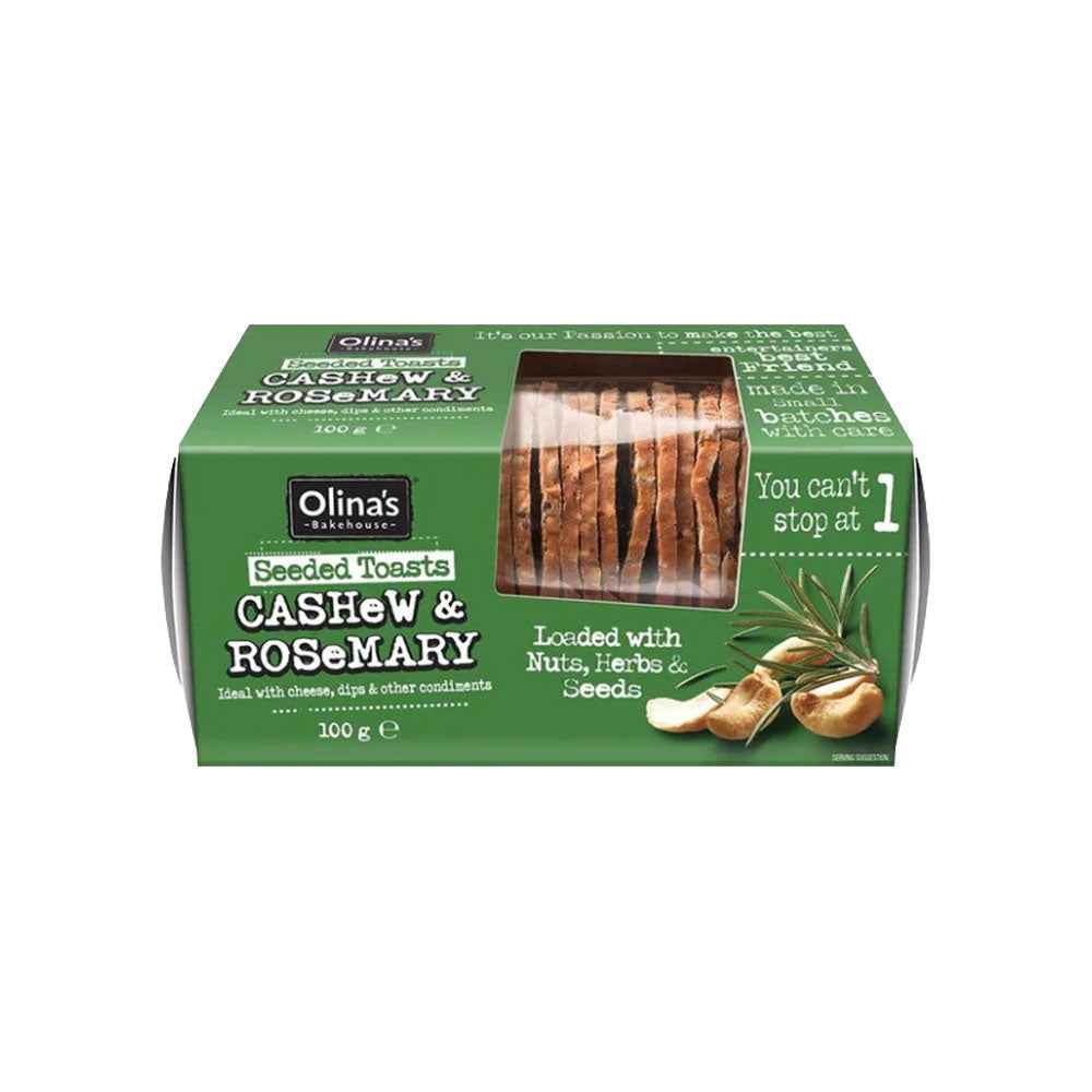 Olina’s Cashew & Rosemary Seeded Toasts (100g), artisanal twice-baked seeded toasts with cashews and rosemary, offering a crisp texture and savoury nutty flavour ideal for cheese boards and gourmet pairings.