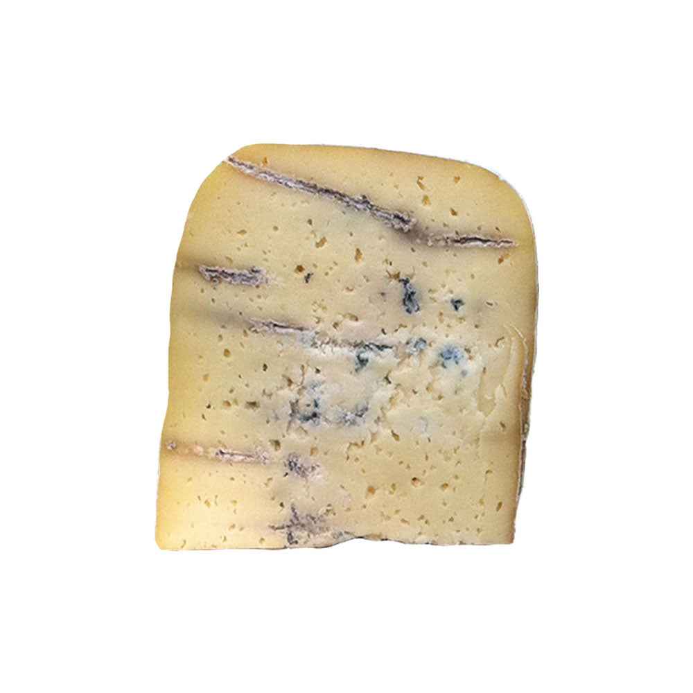 Cow Blue Gouda Cheese with a semi-hard texture and delicate blue veining, combining creamy Gouda richness with mild earthy blue cheese notes. Available for same day delivery in Dubai. Free delivery over AED249.