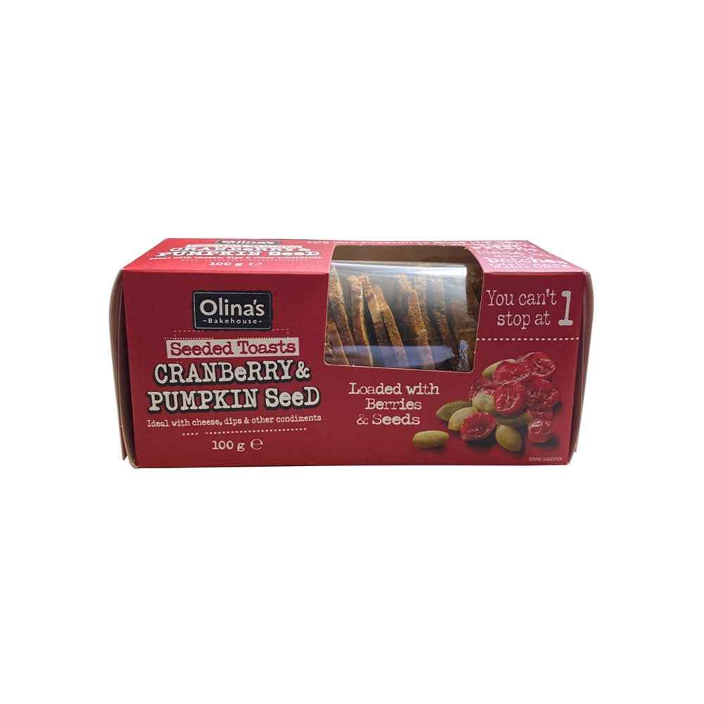 Olinas Cranberry & Pumpkin Seeded Toasts (100g), twice-baked artisanal seeded crackers with cranberries and pumpkin seeds, offering a crisp texture and lightly sweet, nutty flavour ideal for cheese pairings and grazing boards.