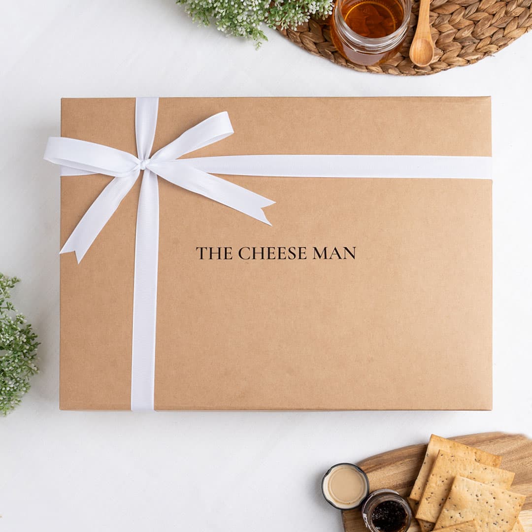 The Cheese Man luxury gift box packaging for gourmet cheese platters, charcuterie boards, artisan cheeses, and premium gifting in Dubai and across the UAE. Available for same day delivery in Dubai. Free delivery over AED249.