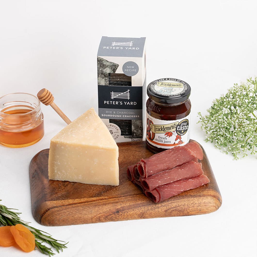 Aged Italian-style hard cheese paired with premium charcuterie, artisan crackers and chilli jam for a refined saver bundle. Available for same-day delivery in Dubai. Free delivery on orders over AED249.