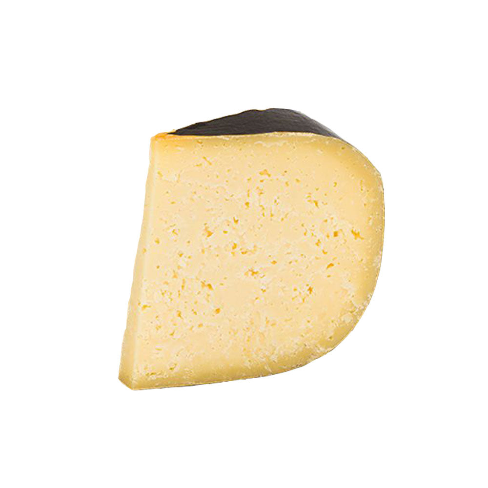 The Cheese Man Portugal 9 months aged cheese, a firm artisanal cheese with rich nutty flavour.