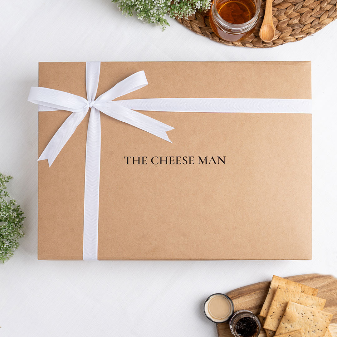 The Cheese Man luxury gift box packaging for gourmet cheese platters, charcuterie boards, artisan cheeses, and premium gifting in Dubai and across the UAE. Available for same day delivery in Dubai. Free delivery over AED249.