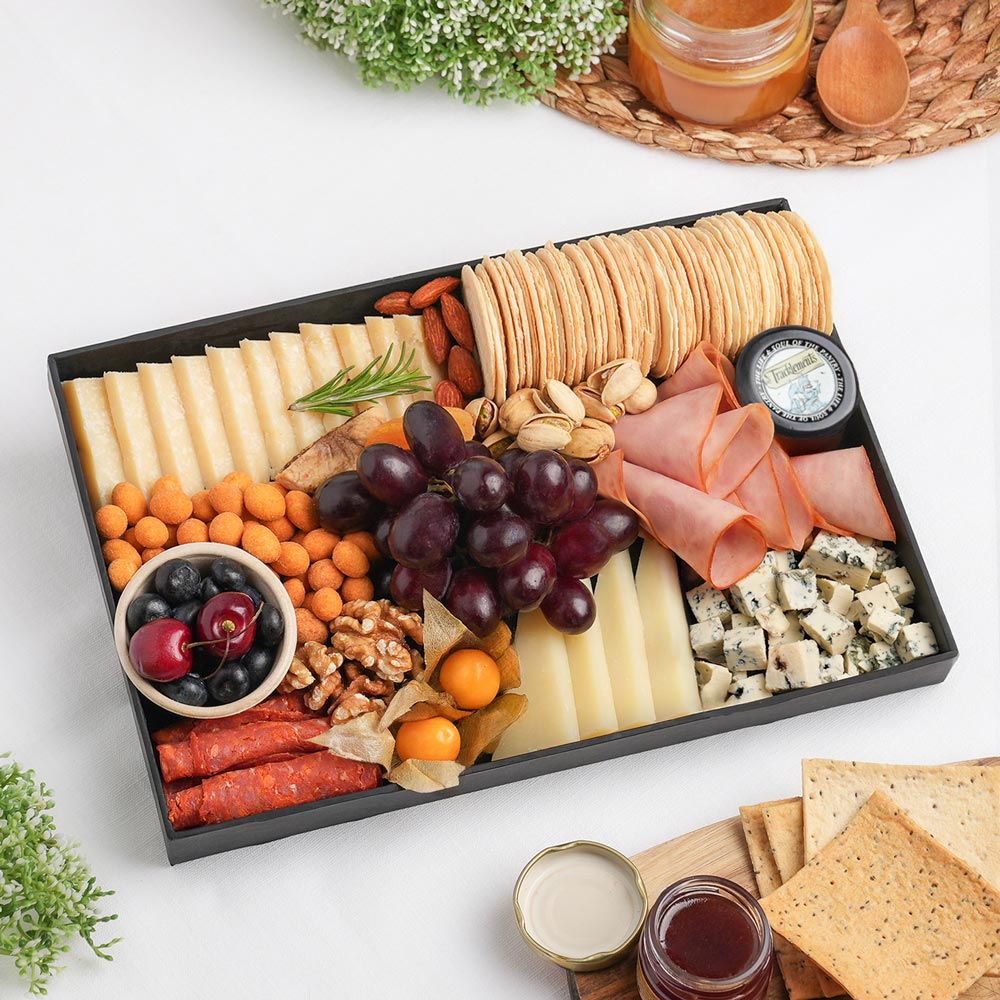 The Italian Cheese Board Small is an artisan cheese board featuring Italian cheeses, Gorgonzola Piccante PDO, Grana Padano 18 Months DOP, Pecorino Romano DOP, and luxury accompaniments, carefully arranged for effortless entertaining. Shop premium cheese platters in Dubai from The Cheese Man. Expertly prepared for same-day delivery across Dubai.