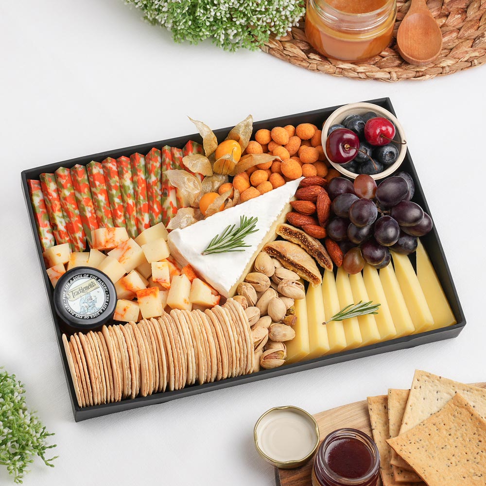 The Vegetarian Cheese Board Small is a handcrafted cheeseboard showcasing Brie De Meaux, Sheep Cheese With Piment D'Espelette Puree, Appenzeller - 3 months - Silver Label, Tricolor Gouda Cheese, and carefully curated premium accompaniments, creating a colourful vegetarian sharing platter. Explore artisan cheeseboard Dubai with The Cheese Man UAE. Available for same-day delivery across Dubai and Abu Dhabi.
